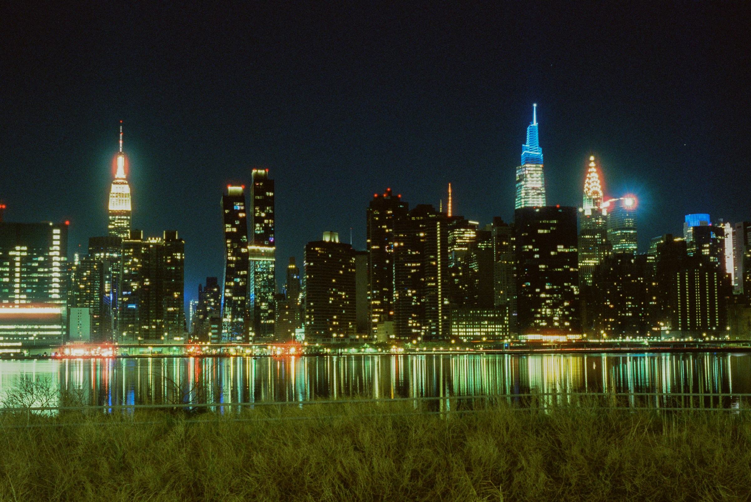 Manhattan skyline at dusk, seen across the East River